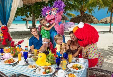 Charaters with children having breakfast