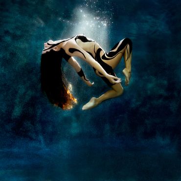 Sunlit underwater body painting