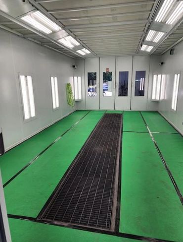 Clean empty green paint booth.