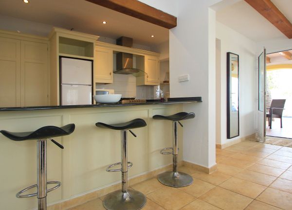 Kitchen and bar in our luxury villa in Javea, Spain