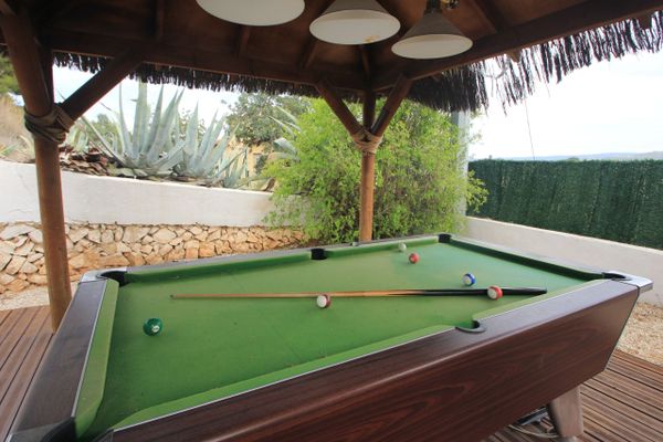 Large garden with a swimming pool and snooker table in our luxury villa in Javea, Spain