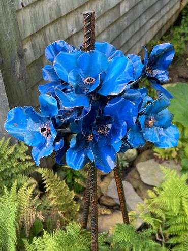 Jeff Alarie botanical sculpture, blue metal flowers with copper details, contemporary art