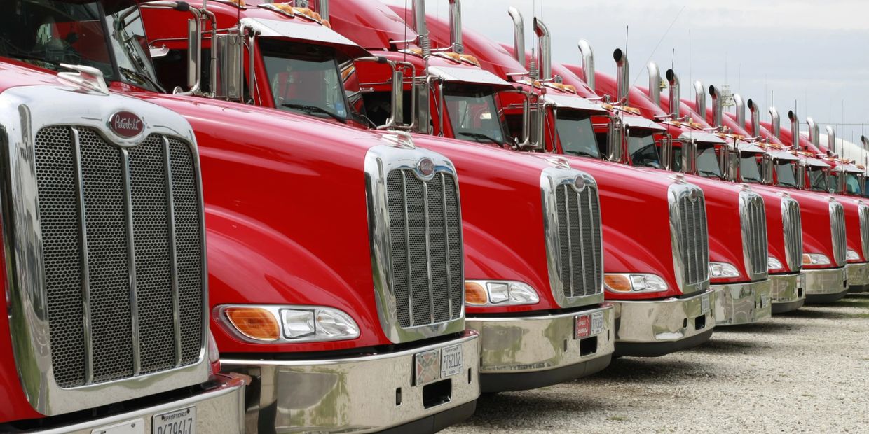 red semi trucks lined up