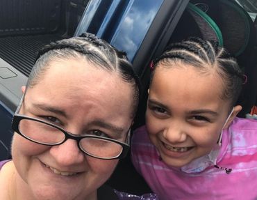 Erin and Lily pose for a mother-and-daughter photo.
