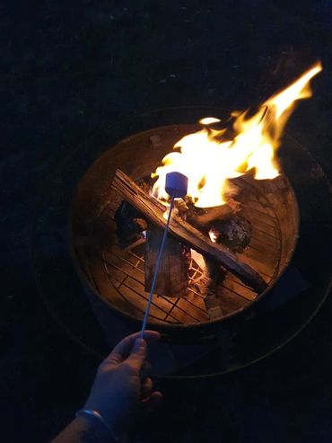 fire pit toasting marshmallows