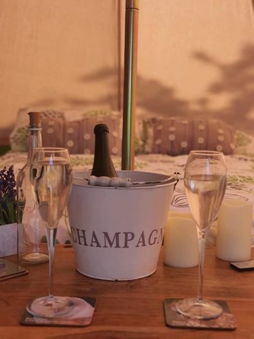 egg plum bell tent with prosecco