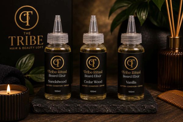 Three bottles of Tribe Ritual Beard Elixir in different scents.