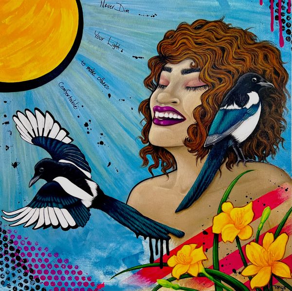 Woman smiling in the sun with Magpies and Day Lilies.