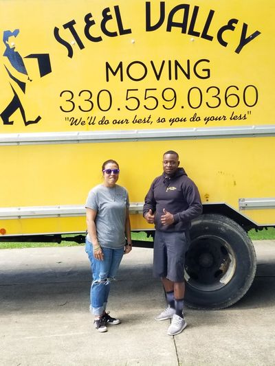 Steel Valley Moving owner Boston Walker with a satisfied customer