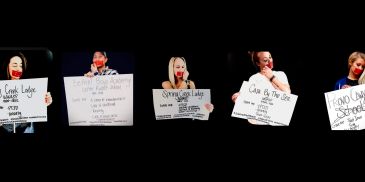 Women holding signs promoting education equality against female genital mutilation.