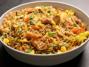 Chicken Fried Rice: A flavorful dish made with cooked rice stir-fried with diced chicken, eggs, vege