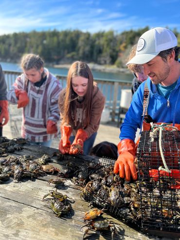 High School Students learning about oyster farming in Maine