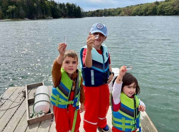 Children on an oyster farm tour in Maine