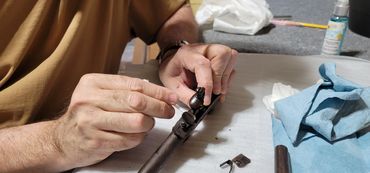 Careful hand repair using conservation framing techniques.