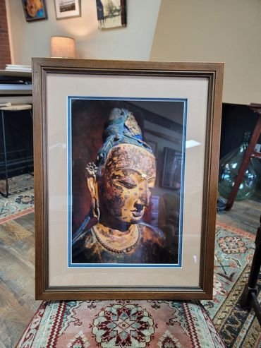 custom framed buddha photograph with warm wood frame