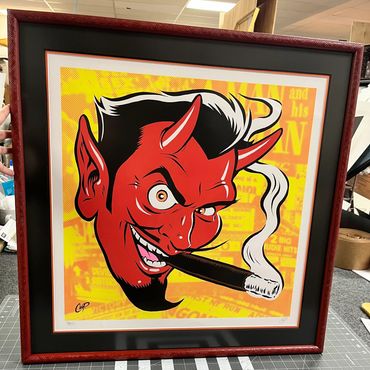 custom framed poster artwork with red frame