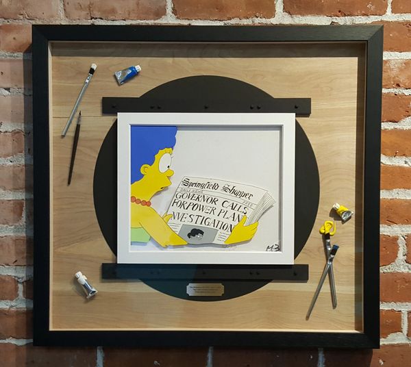 Simpsons animation cel shadowbox framing with art tools, Frameworks Northwest Port Townsend