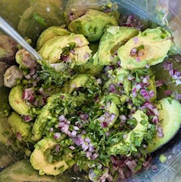Freshly Prepared Guacamole in metal bowl