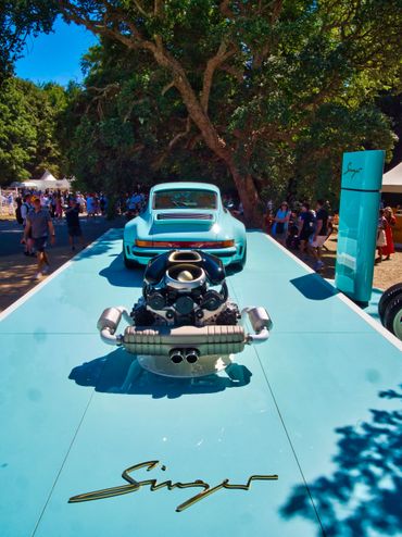 Porsche singer engine and blue car