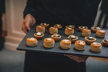 Slate tray of pastry appetizers