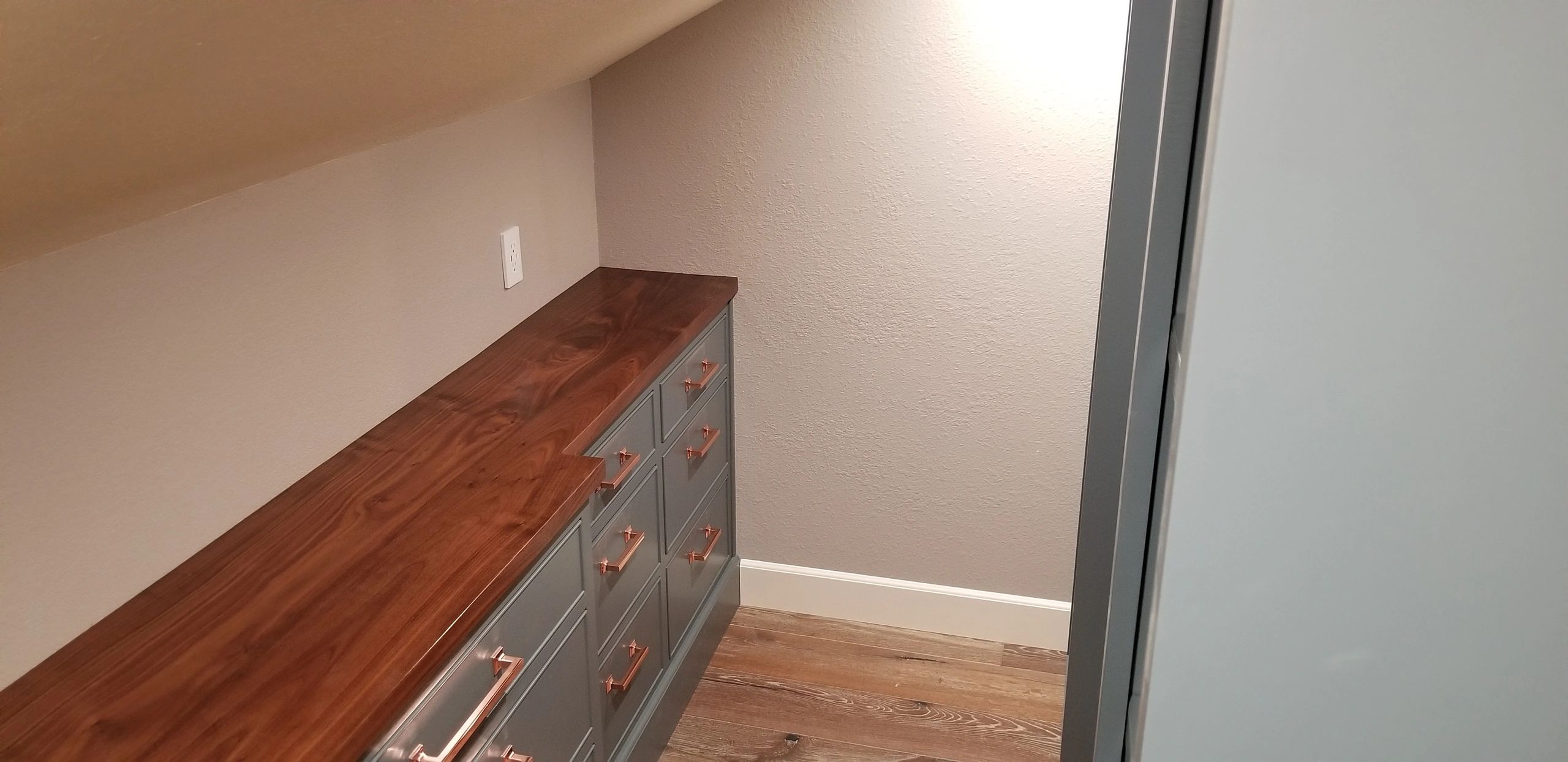 Custom cabinetry in hidden closet
