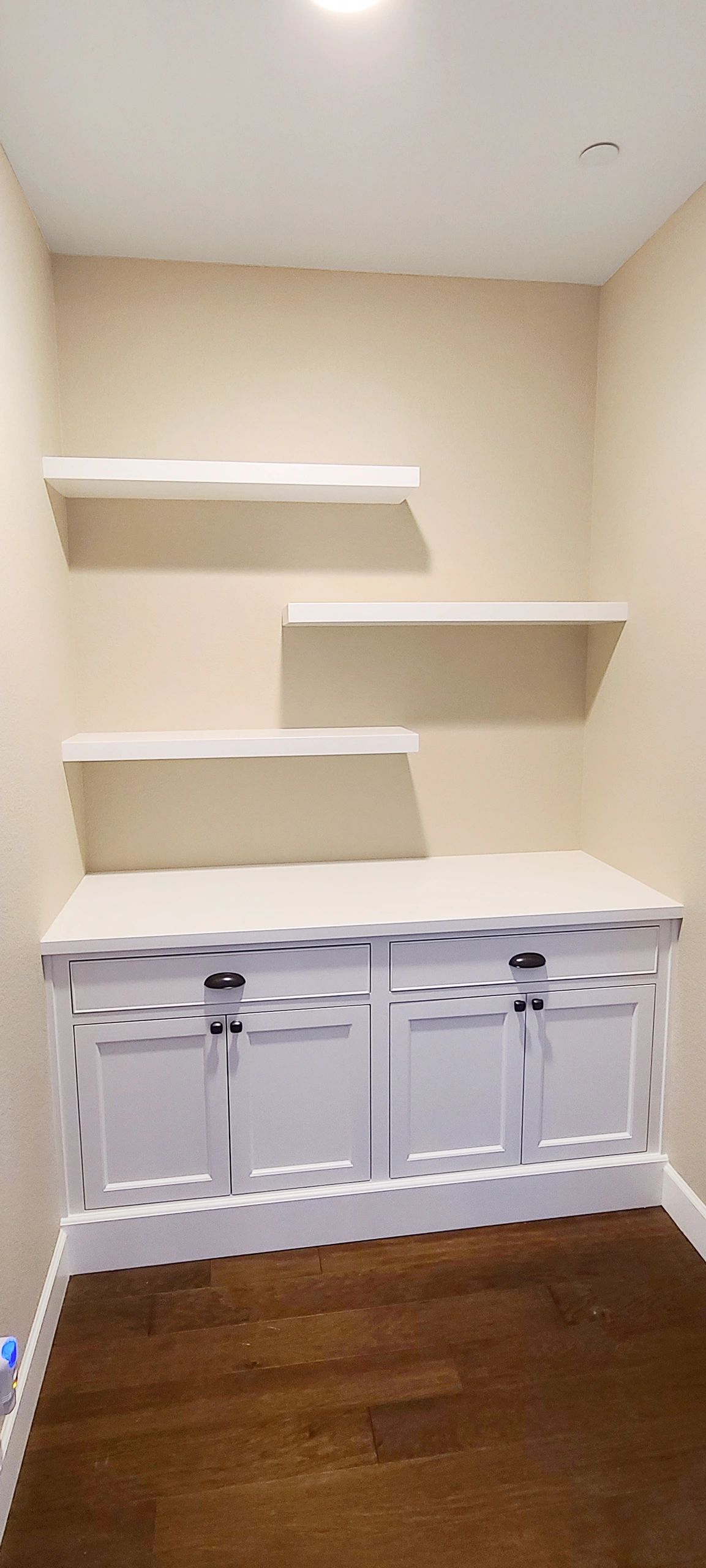 Custom cabinetry with floating shelves
