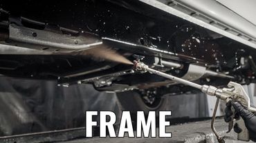 Under frame of fleet vehicle getting rustproofing corrosion protection for fleet cars, trucks, suvs.