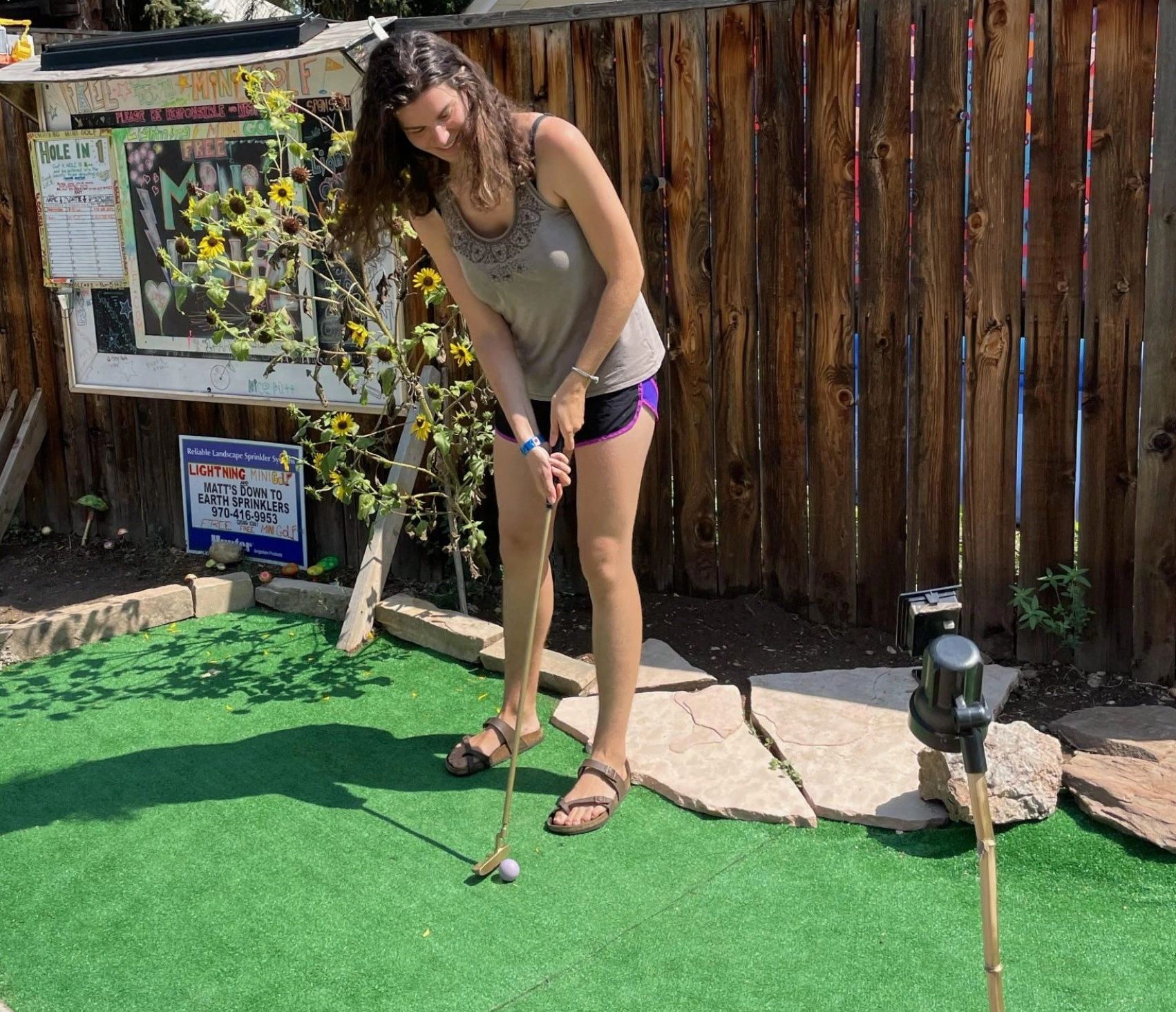 Girl putting on mini golf
Alexa on Lightning Mini Golf Hole #1