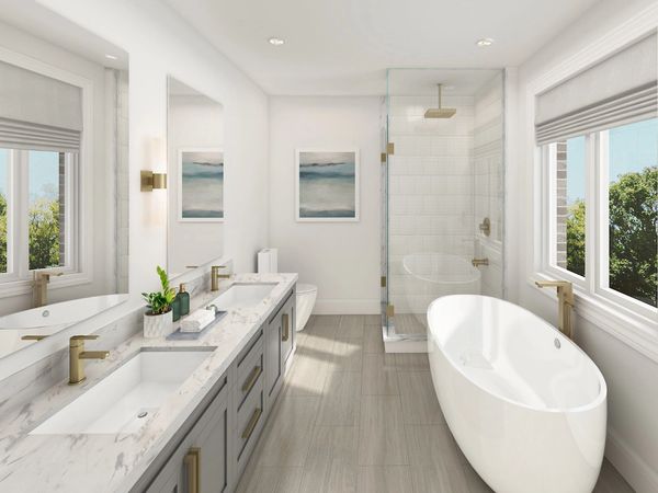 Modern bathroom with double sinks, bathtub, and glass shower.