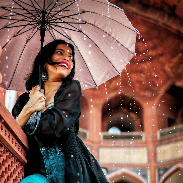 Girl with umbrella in the rain