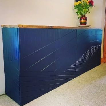 Laser cut wood side board made with a mix of reclaimed woods 