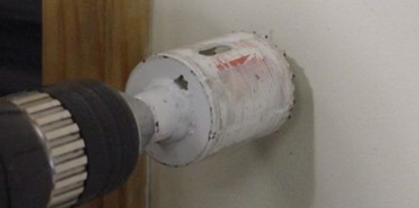 sample hole saw cut for window secuirty bar release