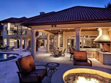 New build of a spacious outdoor living with a firepit