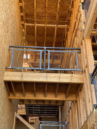 Welding steel railings Mesa, Arizona Modern industrial style building facade with metal.