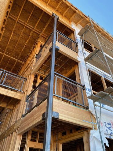 Welding steel railings Mesa, Arizona Modern industrial style building facade with metal.