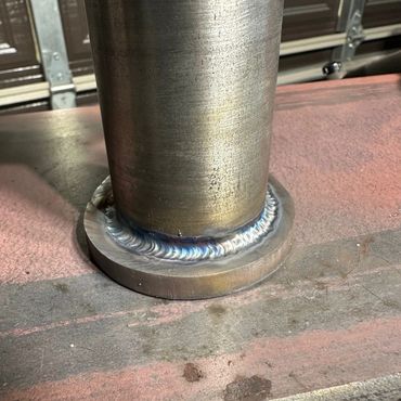 Custom fabricated steel pins for a tractor