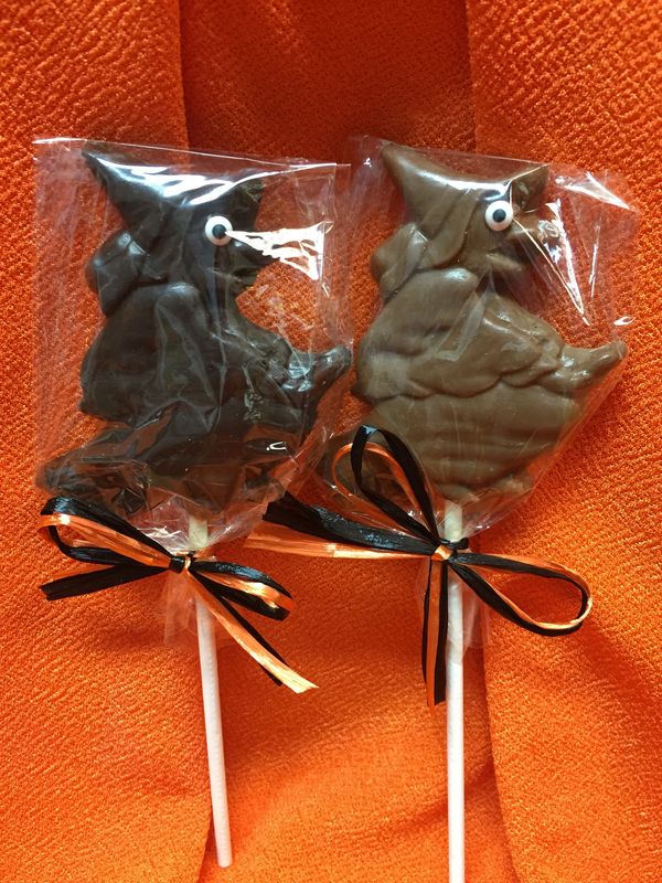 Milk or Dark witch pop tied in halloween colors.