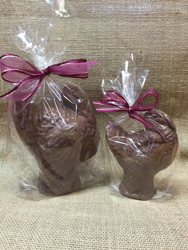3D milk or dark turkeys, tied in burgundy ribbon.