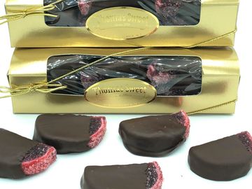 Chocolate covered pomegranate fruit slices in our large gold window box.