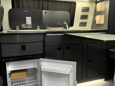 cherry red T6.1 campervan, brand new conversion, Leighton vans kit, campervan kitchen, west dubs