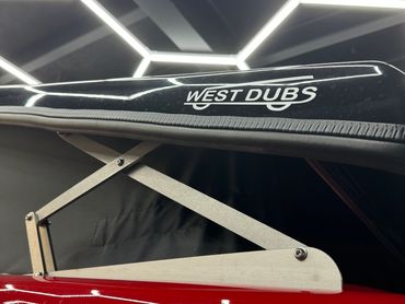 West Dubs pop top roof in black on a cherry red vw t6.1 campervan for sale