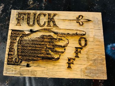 Handmade engraved "fuck off" sign created by Pirate Monkey Art