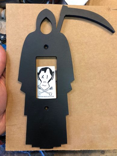 Handmade Grim Reaper light switch cover created by Pirate Monkey Art