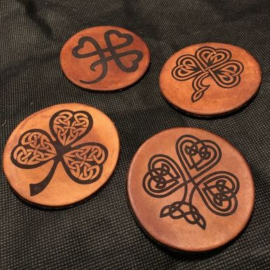 Laser engraved leather celtic coasters created by Pirate Monkey Art