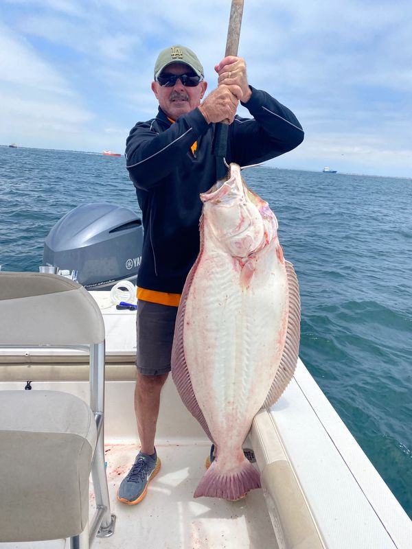 50 Pound California Halibut caught deep sea fishing in Huntington Beach CA