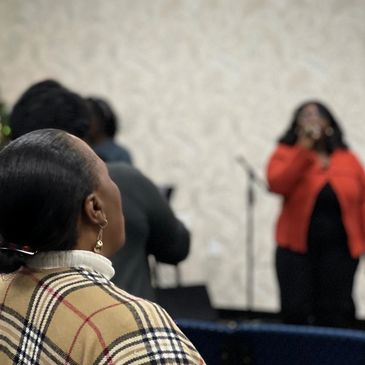 Woman in church oraying
