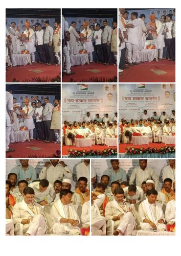 Political event with speeches, awards, and group discussions on a decorated stage.