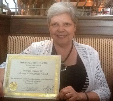 Monique Gregory Receiving a Therapeutic Touch Lifetime Achievement Award