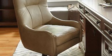 tan leather desk chair an wood desk
