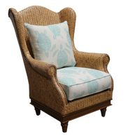 wicker or rattan chair with cushion seat and back pillow